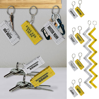 Schlüsselanhänger 4er Set Zollstock 4 Sprüche weiß/gelb 6,5x1,3x2,4cm Maßstab Schlüsselring Meterstab Anhänger