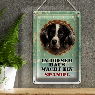 Blechschild Hund 20x30cm in diesem Haus wacht ein Spaniel