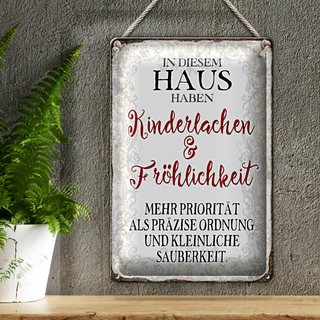 Blechschild Spruch 20x30cm in diesem Haus Kinderlachen