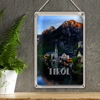 Blechschild Reise 20x30cm Tirol Stadt am Wasser Gebirge