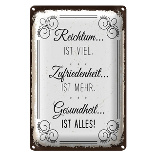 Blechschild Spruch Reichtum viel Zufriedenheit mehr 20x30cm