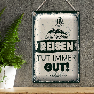 Blechschild Spruch Voltaire Reisen tut immer gut 20x30cm