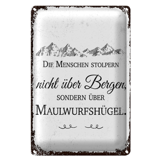 Blechschild Spruch Menschen stolpern nicht über Bergen 20x30cm