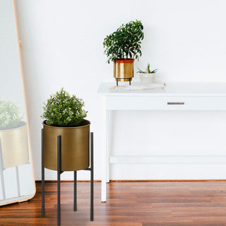 Pflanztopf gold auf schwarzem Gestell Blumenständer Übertopf