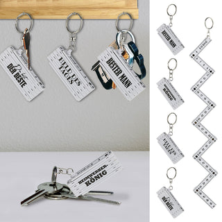 Schlüsselanhänger 4er Set Zollstock 4 Sprüche weiß/gelb 6,5x1,3x2,4cm Maßstab Schlüsselring Meterstab Anhänger