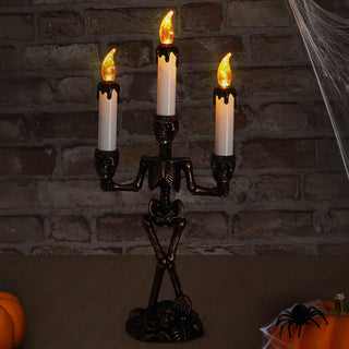 LED Kerzenständer Totenkopf dreiarmig 15x36x8cm schwarz gold weiß Plastik gelb flackernd Halloween Kandelaber Totenköpfe