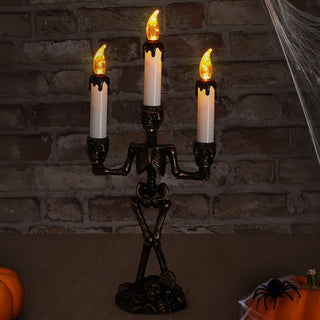 LED Kerzenständer Totenkopf dreiarmig 15x36x8cm schwarz gold weiß Plastik gelb flackernd Halloween Kandelaber Totenköpfe