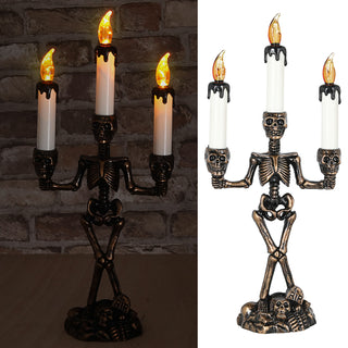 LED Kerzenständer Totenkopf dreiarmig 15x36x8cm schwarz gold weiß Plastik gelb flackernd Halloween Kandelaber Totenköpfe