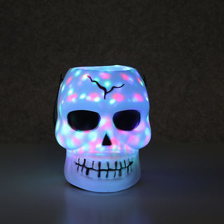 LED Party Licht Halloween Totenkopf 12x16x12cm Kunststoff weiß schwarz Sound bunt leuchtend rotierende LEDs Gruseldekoration