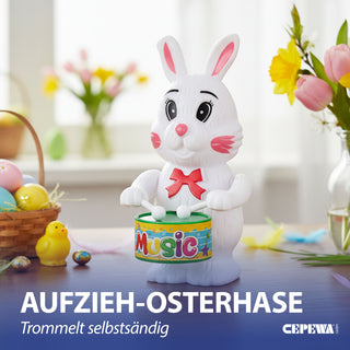 Aufziehfigur Hase mit Trommel 9x12x7cm weiß mehrfarbig Kunststoff Aufziehspielzeug Osterdekoration Osterhase hüpfend