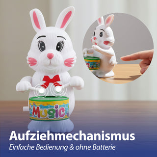 Aufziehfigur Hase mit Trommel 9x12x7cm weiß mehrfarbig Kunststoff Aufziehspielzeug Osterdekoration Osterhase hüpfend