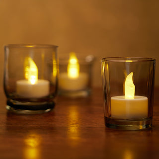 LED Teelicht 12er Set Ø4xH2cm Kunststoff Metall weiß Timerfunktion Kerze gelb flackernd flammenlos batteriebetrieben